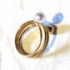 Arrière bague double sphères perles fil multicouche