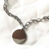 Arrière collier pendentif argenté petit médaillon solaire