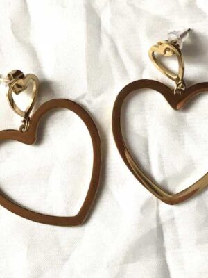 Boucles oreilles dorées forme gros coeurs double amour