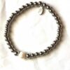 Bracelet complet extensible argenté grosse perle blanche