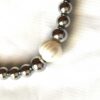 Bracelet extensible argenté grosse perle blanche
