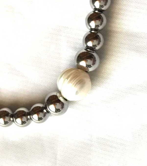 Bracelet extensible argenté grosse perle blanche