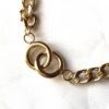 Collier pendentif double cercles anneaux maillons torsadés