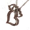 Arrière collier pendentif argenté triple cœurs un gros deux petits amour