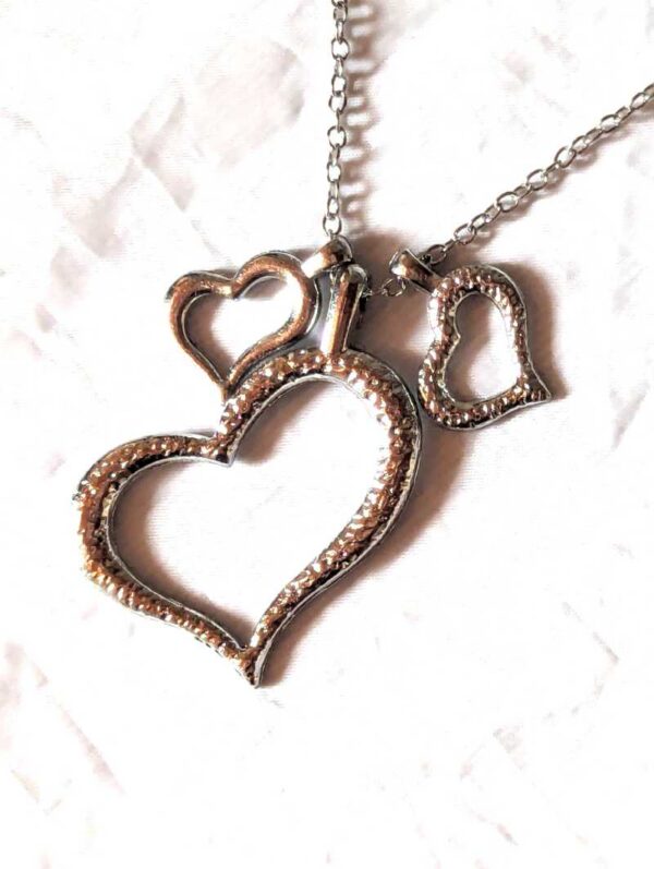 Collier pendentif argenté triple cœurs un gros deux petits amour